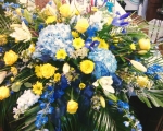 Casket spray blue and yellow
